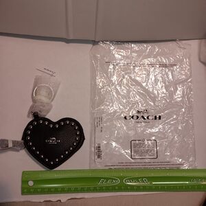 NWTCoach Black leather with silver rivets bag charm